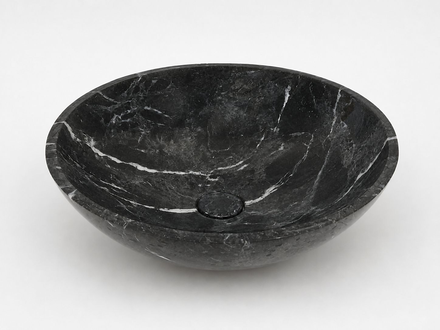 Lavabo tondo in marmo nero venato